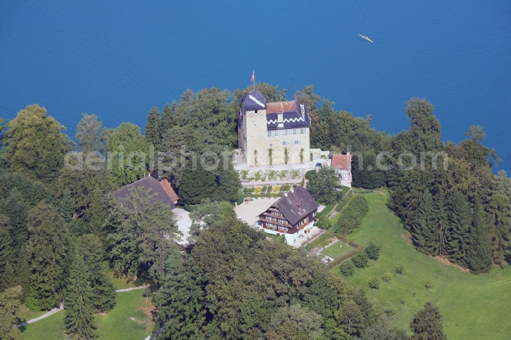 Buonas from above - Idyllic situated at Lake Zug is the Buonas Castle on the peninsula Buonas in Risch in Switzerland. The Buonas Castle, also known as Castle Hertenstein, serves as a training center for managment people of the pharmaceutical company Roche