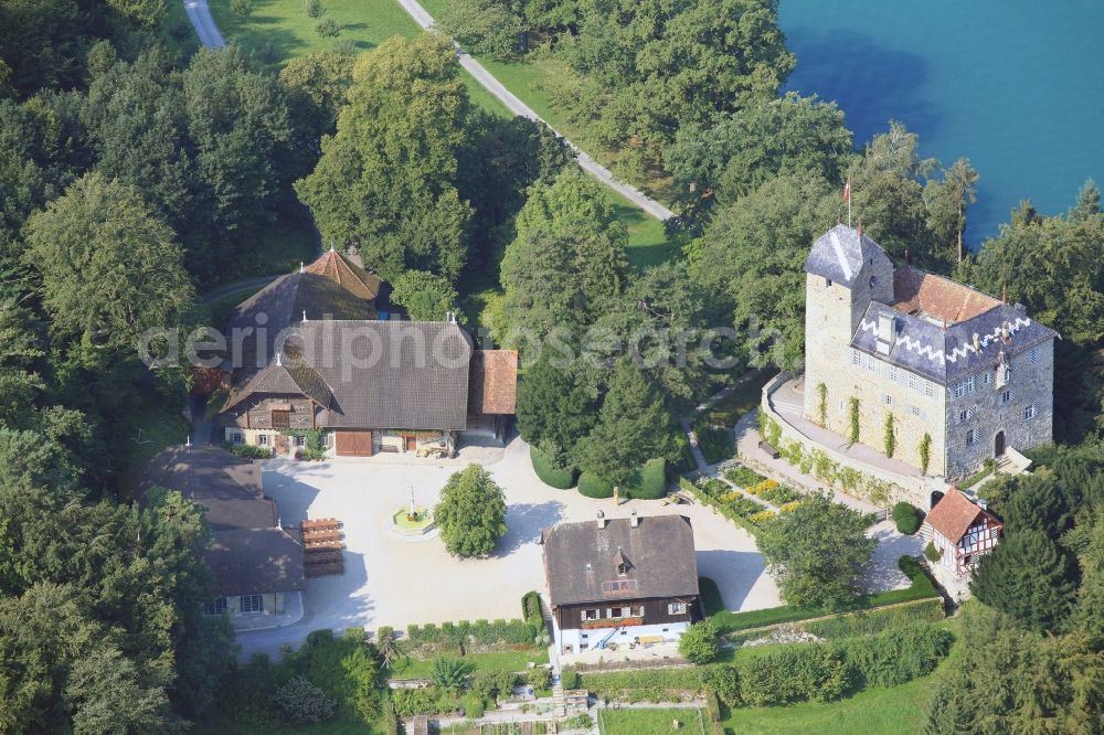 Aerial photograph Buonas - Idyllic situated at Lake Zug is the Buonas Castle on the peninsula Buonas in Risch in Switzerland. The Buonas Castle, also known as Castle Hertenstein, serves as a training center for managment people of the pharmaceutical company Roche