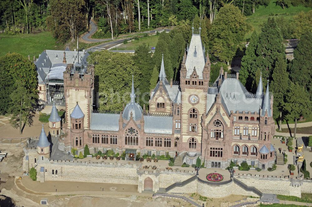 Aerial image Königswinter - Blick auf das Schloss Drachenburg, ein schlossartiges Anwesen auf dem Drachenfels in Königswinter. Es wurde von 1882 bis 1884 als repräsentativer Wohnsitz gebaut. Seit 1986 steht das Schloss Drachenburg unter Denkmalschutz und wurde 1990 der Nordrhein-Westfalen-Stiftung unterstellt. View of the Castle Drachenburg, a castle-like estate on the Drachenfels in Konigswinter. It was built from 1882 to 1884 as a representative residence. Since 1986 the Castle Drachenburg is a listed building.