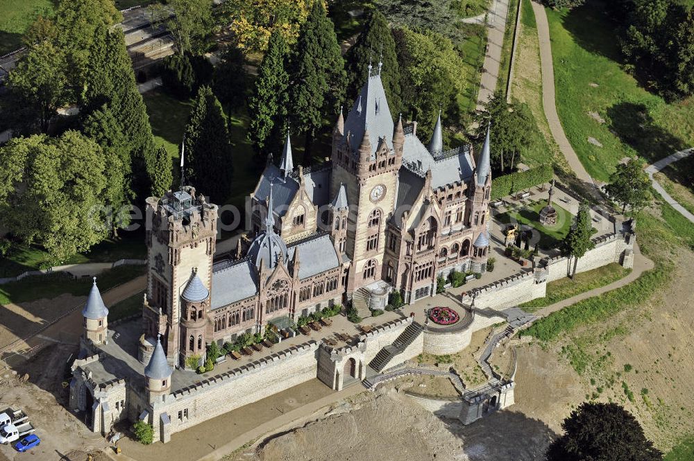 Aerial photograph Königswinter - Blick auf das Schloss Drachenburg, ein schlossartiges Anwesen auf dem Drachenfels in Königswinter. Es wurde von 1882 bis 1884 als repräsentativer Wohnsitz gebaut. Seit 1986 steht das Schloss Drachenburg unter Denkmalschutz und wurde 1990 der Nordrhein-Westfalen-Stiftung unterstellt. View of the Castle Drachenburg, a castle-like estate on the Drachenfels in Konigswinter. It was built from 1882 to 1884 as a representative residence. Since 1986 the Castle Drachenburg is a listed building.