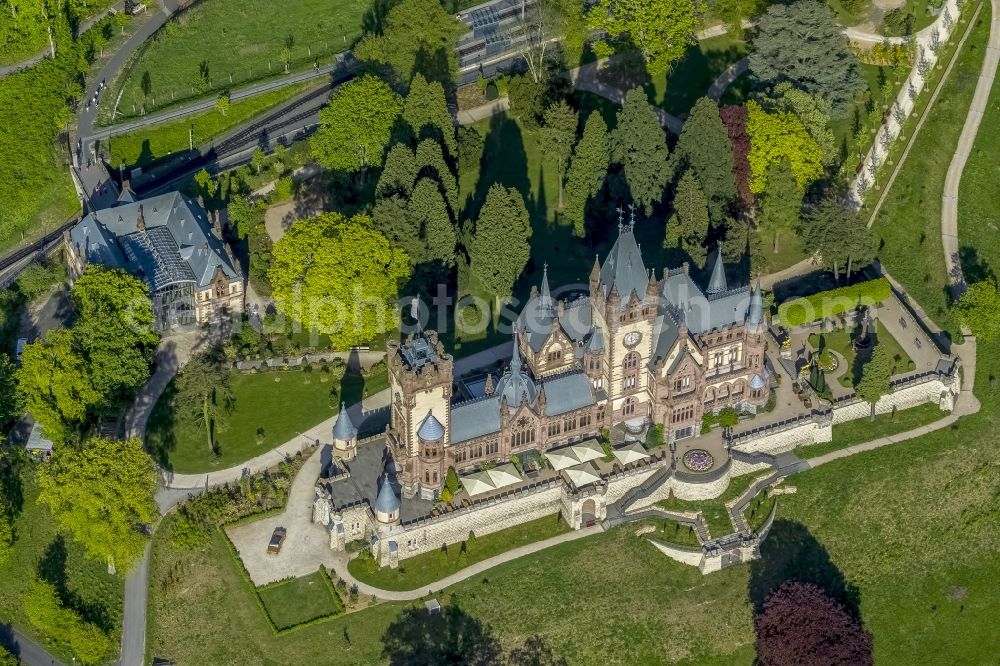 Königswinter from above - View of Castle Dragon Castle upon Rhine in Königswinter in the federal state North Rhine-Westphalia. The opened to the public restored and renovated castle is monument protected and operated by the Schloss Drachenburg gGmbH.