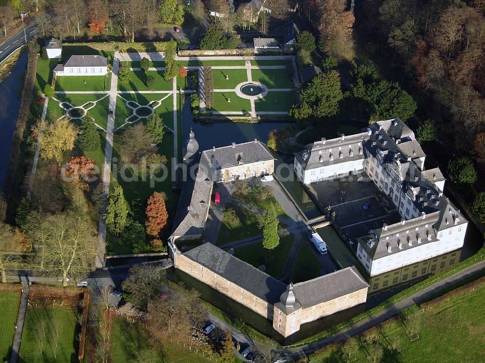 Aerial image Engelskirchen - Blick auf das Schloß Ehreshoven, Das Schloss, erstmalig 1355 erwähnt, war mehr als 500 Jahre im Besitz der Grafen von Nesselrode und wurde 1920 von der letzten Gräfin dieses Geschlechtes der Rheinischen Ritterschaft als Damenstift vermacht. Schloss und Vorburg sind umgeben von einem romantischen Wassergraben und einem französischen Garten mit einem Teehaus aus dem 16. Jahrhundert.Schloß Ehreshoven,Ehreshoven 23,51766 Engelskirchen Nordrhein-Westfalen