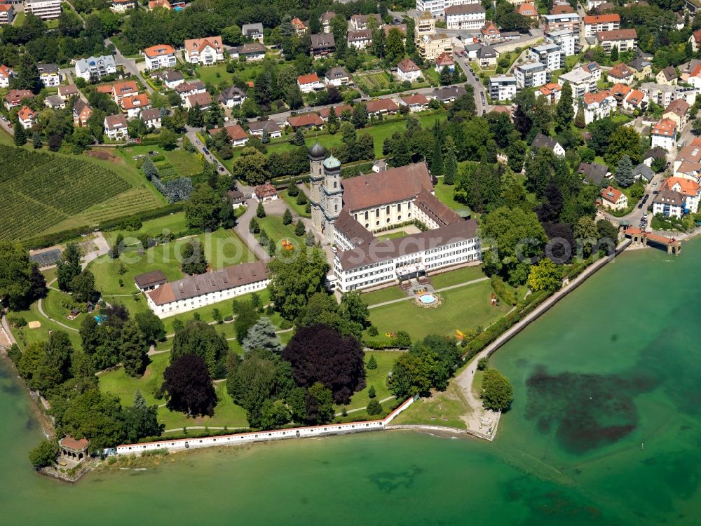 Friedrichshafen from the bird's eye view: Castle Friedrichshafen in the town of Friedrichshafen on Lake Constance in the state of Baden-Württemberg. The castle is actually a former monastery, the monastery Hofen. It became summer residence of the kings of Württemberg in 1824. The church with its two onion shaped towers is the landmark of the town