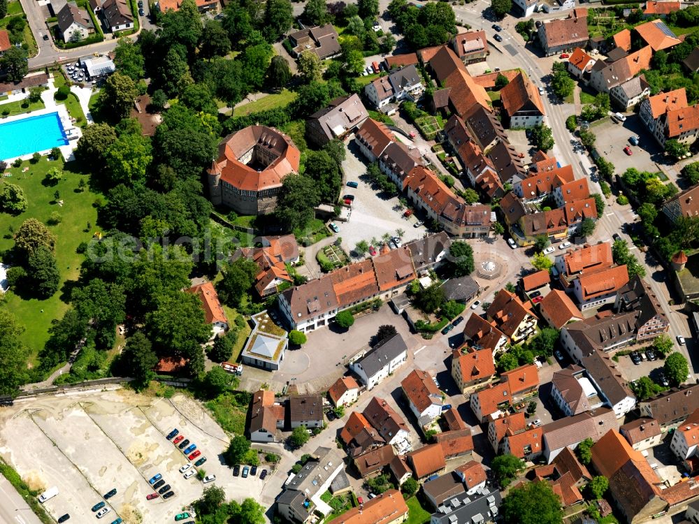 Aerial image Sachsenheim - Castle Großsachsenheim in Sachsenheim in the state of Baden-Württemberg. The castle is a former water castle. The compound forms a dodecagon with a square courtyard and the former water ditch. It is located near the historic city center and an open air pool