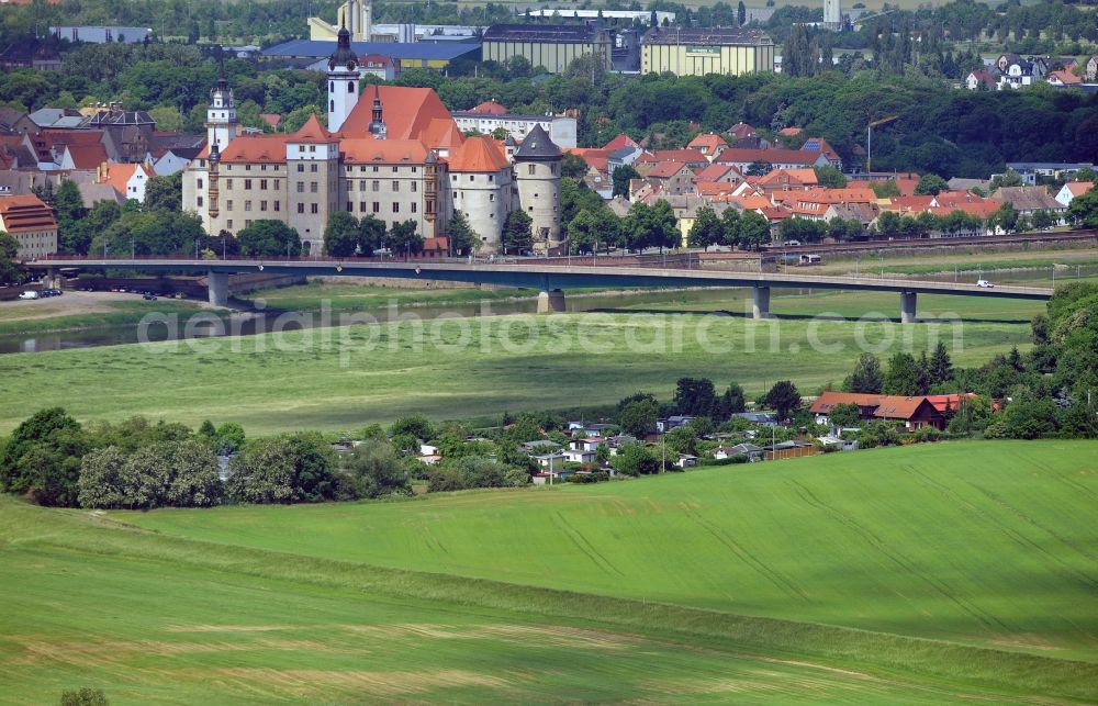 Torgau from above - The castle / palace Hartenfels is situated in Torgau close to the river elbe. It belongs to the federal state of Saxony. The construction was startes by Konrad Pflueger and finished by Konrad Krebs during the time of renaissance. The chapell of the castle was the first protestant church in the world and was built by Nikolaus Gromann