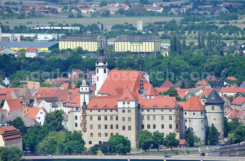 Torgau from the bird's eye view: The castle / palace Hartenfels is situated in Torgau close to the river elbe. It belongs to the federal state of Saxony. The construction was startes by Konrad Pflueger and finished by Konrad Krebs during the time of renaissance. The chapell of the castle was the first protestant church in the world and was built by Nikolaus Gromann