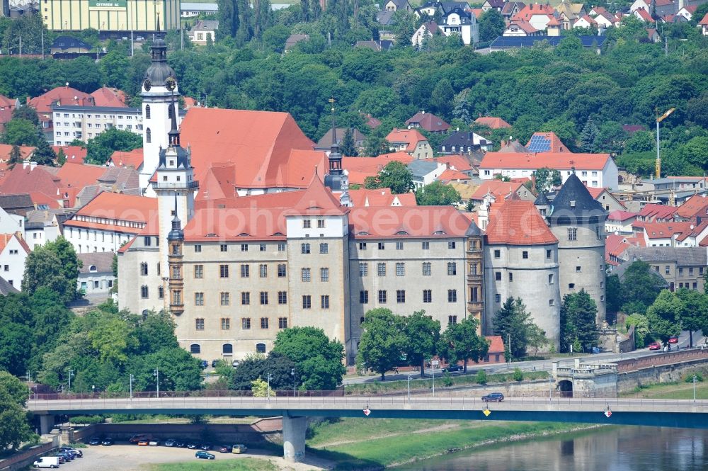 Aerial image Torgau - The castle / palace Hartenfels is situated in Torgau close to the river elbe. It belongs to the federal state of Saxony. The construction was startes by Konrad Pflueger and finished by Konrad Krebs during the time of renaissance. The chapell of the castle was the first protestant church in the world and was built by Nikolaus Gromann