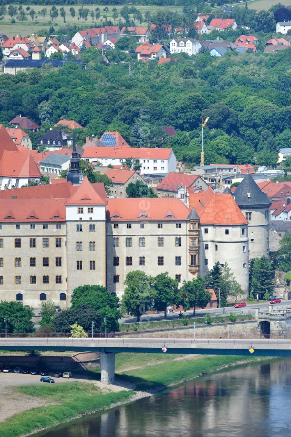 Aerial photograph Torgau - The castle / palace Hartenfels is situated in Torgau close to the river elbe. It belongs to the federal state of Saxony. The construction was startes by Konrad Pflueger and finished by Konrad Krebs during the time of renaissance. The chapell of the castle was the first protestant church in the world and was built by Nikolaus Gromann