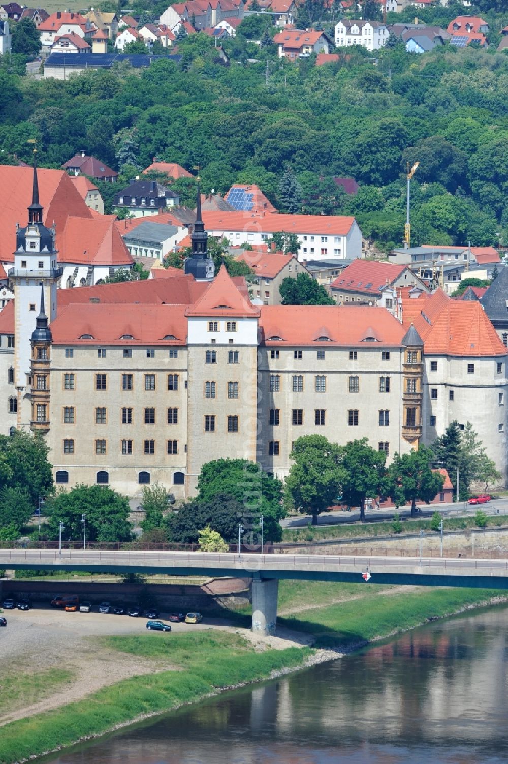 Torgau from above - The castle / palace Hartenfels is situated in Torgau close to the river elbe. It belongs to the federal state of Saxony. The construction was startes by Konrad Pflueger and finished by Konrad Krebs during the time of renaissance. The chapell of the castle was the first protestant church in the world and was built by Nikolaus Gromann