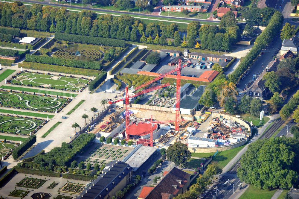 Hannover from the bird's eye view: Baustelle Schloss Herrenhausen in Hannover Niedersachsen. Das Schloss wird derzeit von der IVA Dr. A. Steiger KG, eine Tochtergesellschaft der Volkswagenstiftung, neu errichtet. Es wurde 1638 erbaut und im zweiten Weltkrieg von Bomben zerstört. Das wieder aufgebaute Schloss soll vor allem als modernes Tagungszentrum und Schlossmuseum fungieren. Currently The Castle Herrenhausen in Hannover Niedersachsen is under reconstruction from IVA Dr. A. Steiger KG. It was build in 1638 and was ruined by bombs in the second worldwar. The new Castle shall be used as a day-care centre and castle museum.