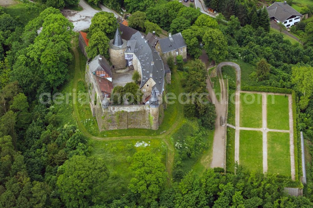 Hagen from above - View of the Castle Hohenlimburg in Hagen in the state North Rhine-Westphalia. The Castle Hohenlimburg is a former hill castle at the Schlossberg. It is one of the few castles in Westphalia, which are widely preserved in their origin structure