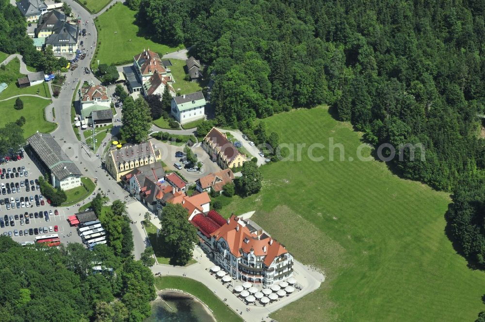 Aerial photograph Hohenschwangau - View of the castle Hohenschwangau in Schwangau in Bavaria. The current owner of the castle is the Wittelsbach Compensation Fund