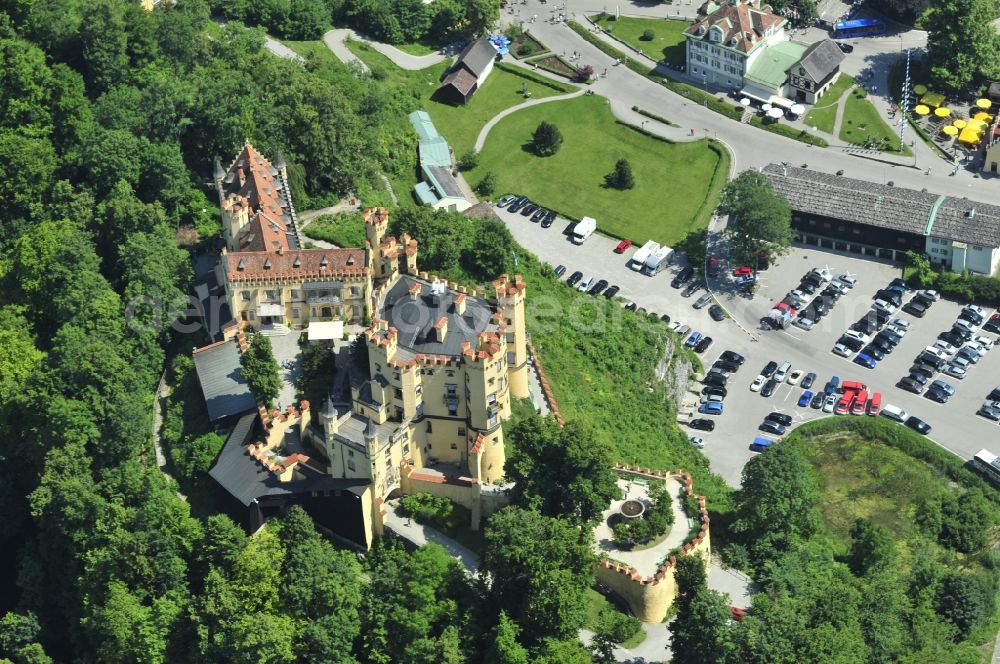 Hohenschwangau from above - View of the castle Hohenschwangau in Schwangau in Bavaria. The current owner of the castle is the Wittelsbach Compensation Fund