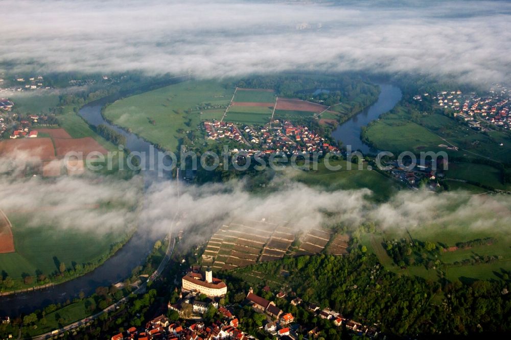 Gundelsheim from above - Castle of Schloss Horneck between clouds in Gundelsheim in the state Baden-Wuerttemberg