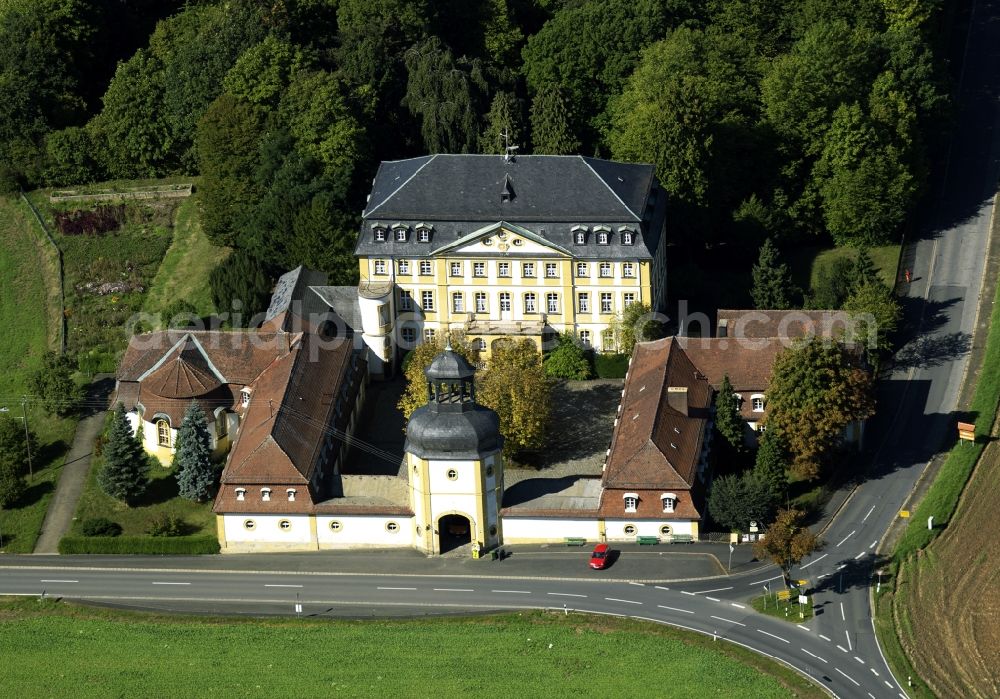 Eggolsheim from the bird's eye view: Castle Jaegersburg in the Bammersdorf part of Eggolsheim in the state of Bavaria. The baroque hunting castle is located on the Eastern edge of the village. The compound includes a forested castle park. It consists of a multi-floor main building and a one storey wall with outbuildings and a small tower over the main gate