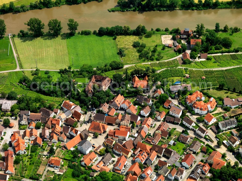 Aerial image Ingersheim - Kleiningersheim Castle in the Kleiningersheim part of the town of Ingersheim in the state of Baden-Württemberg. Overview of the town part and fields on the western riverbank of the river Neckar. Originally built as a fortress, site was later converted to a castle with a tower and a rectangular courtyard. It is Wolfgang Gerberely owned