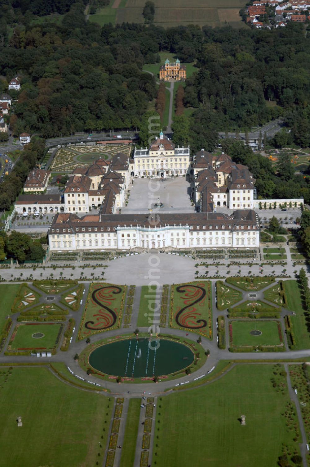 Ludwigsburg from the bird's eye view: Blick auf das Schloss Ludwigsburg mit Gartenanlage und dem Schloss Favorite im Hintergrund. Das Residenzschloss in Ludwigsburg wurde zwischen 1704 und 1733 unter der Herrschaft von Herzog Eberhard Ludwig von Württemberg im Barockstil errichtet. Es ist eine der größten barocken Schlossanlagen Deutschlands. Kontakt: Schlossverwaltung Ludwigsburg, Schlossstraße 30, 71634 Ludwigsburg, Tel. +49(0)7141 18-2004, Fax +49(0)7141 18-6434, E-mail: info@schloss-ludwigsburg.de