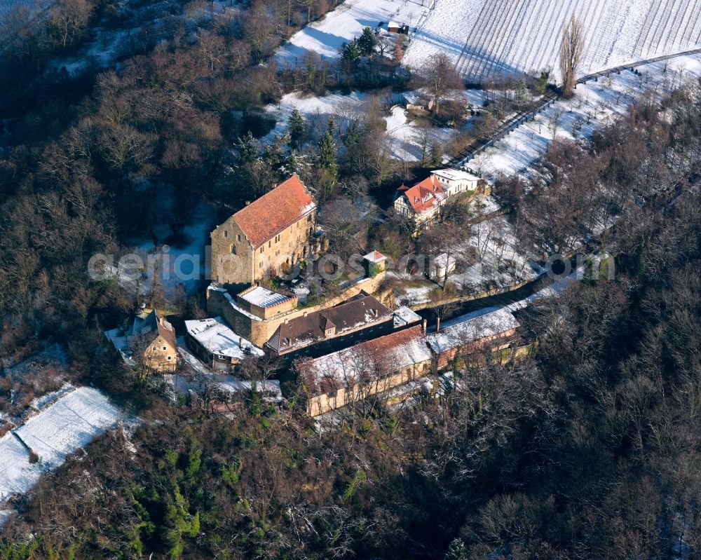 Cleebronn from the bird's eye view: Magenheim Castle in Cleebronn in the state of Baden-Wuerttemberg. The snow covered castle is one of the most well preserved fortresses in Germany. It was built in the 13th century and refurbished several times after that. The complex is located on Michaelsberg Mountain and includes a large hall, a moat and a ring wall. Today it is used as an event location