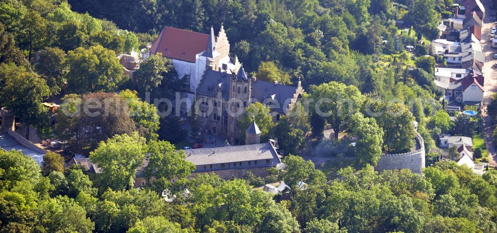 Mansfeld from above - Die, im Zustand der Sanierung befindliche, Burg Mansfeld in Mansfeld, Sachsen-Anhalt. Seit 1999 ist das Schloss Eigentum des Fördervereins Schloss Mansfeld e.V. und ist heute eine christliche Jugendbildungs- und Begegnungsstätte. Castle Mansfeld in the state of renovation in Mansfeld, Saxony-Anhalt. Since 1999 the castle is property of the society Förderverein Schloss Mansfeld e.V. and today it is a christian youth educational and community center.