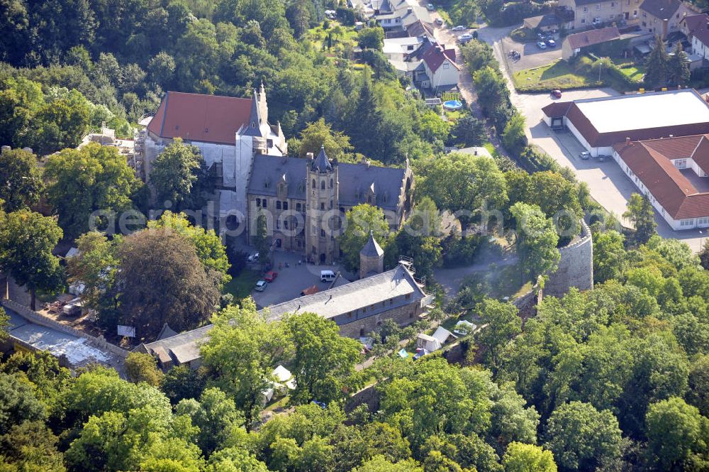 Mansfeld from the bird's eye view: Die, im Zustand der Sanierung befindliche, Burg Mansfeld in Mansfeld, Sachsen-Anhalt. Seit 1999 ist das Schloss Eigentum des Fördervereins Schloss Mansfeld e.V. und ist heute eine christliche Jugendbildungs- und Begegnungsstätte. Castle Mansfeld in the state of renovation in Mansfeld, Saxony-Anhalt. Since 1999 the castle is property of the society Förderverein Schloss Mansfeld e.V. and today it is a christian youth educational and community center.