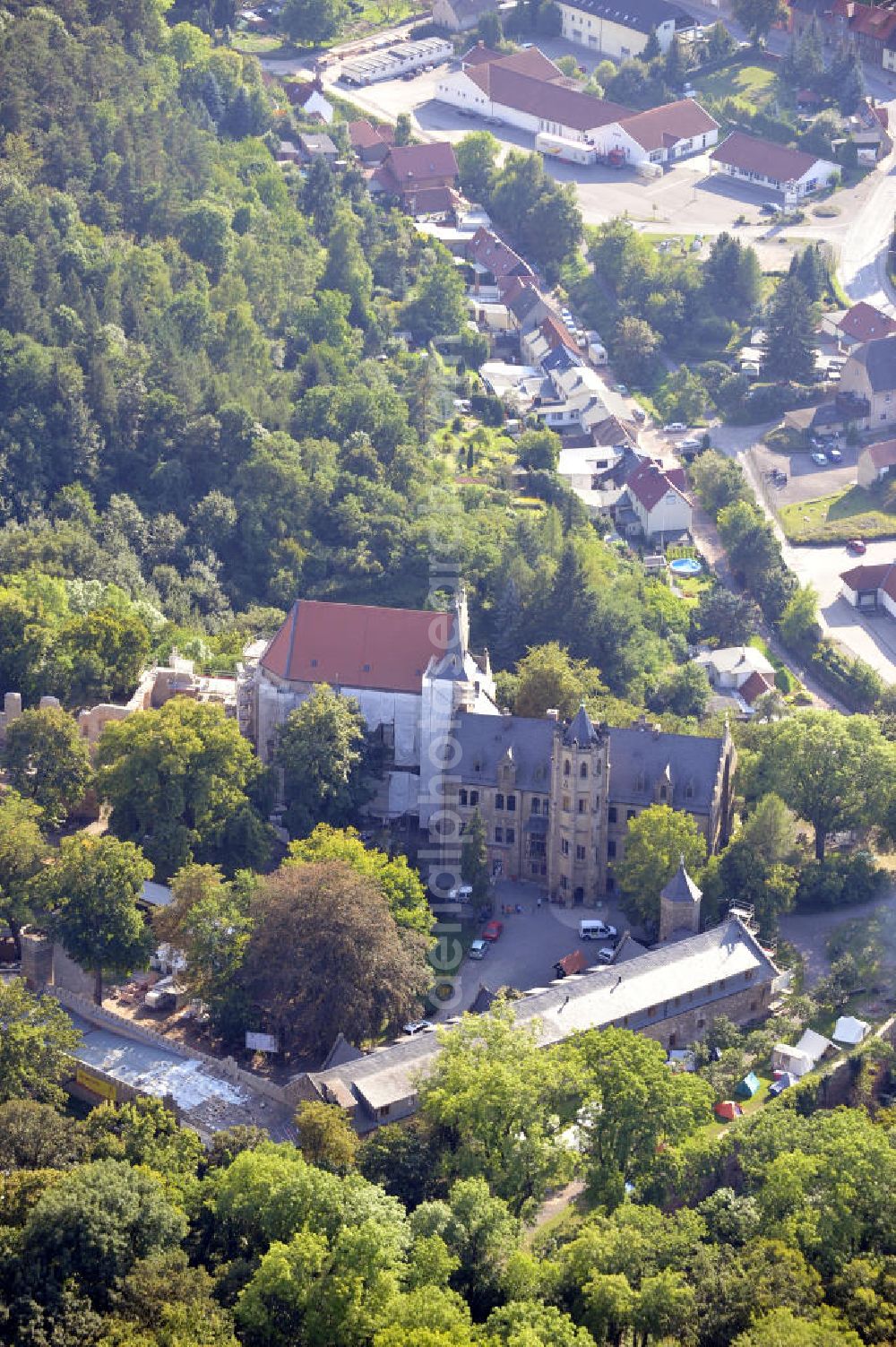 Aerial image Mansfeld - Die, im Zustand der Sanierung befindliche, Burg Mansfeld in Mansfeld, Sachsen-Anhalt. Seit 1999 ist das Schloss Eigentum des Fördervereins Schloss Mansfeld e.V. und ist heute eine christliche Jugendbildungs- und Begegnungsstätte. Castle Mansfeld in the state of renovation in Mansfeld, Saxony-Anhalt. Since 1999 the castle is property of the society Förderverein Schloss Mansfeld e.V. and today it is a christian youth educational and community center.