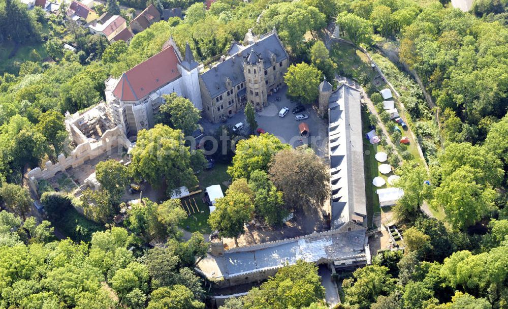 Mansfeld from the bird's eye view: Die, im Zustand der Sanierung befindliche, Burg Mansfeld in Mansfeld, Sachsen-Anhalt. Seit 1999 ist das Schloss Eigentum des Fördervereins Schloss Mansfeld e.V. und ist heute eine christliche Jugendbildungs- und Begegnungsstätte. Castle Mansfeld in the state of renovation in Mansfeld, Saxony-Anhalt. Since 1999 the castle is property of the society Förderverein Schloss Mansfeld e.V. and today it is a christian youth educational and community center.