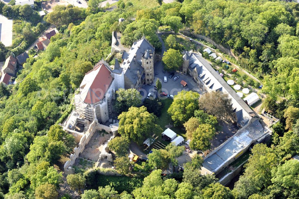 Aerial image Mansfeld - Die, im Zustand der Sanierung befindliche, Burg Mansfeld in Mansfeld, Sachsen-Anhalt. Seit 1999 ist das Schloss Eigentum des Fördervereins Schloss Mansfeld e.V. und ist heute eine christliche Jugendbildungs- und Begegnungsstätte. Castle Mansfeld in the state of renovation in Mansfeld, Saxony-Anhalt. Since 1999 the castle is property of the society Förderverein Schloss Mansfeld e.V. and today it is a christian youth educational and community center.