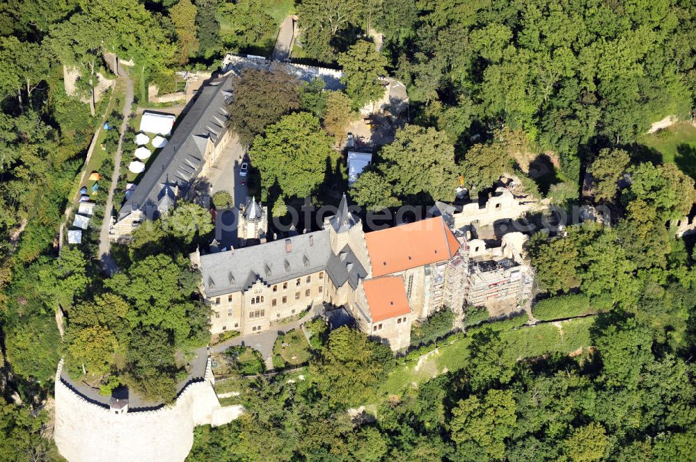 Mansfeld from above - Die, im Zustand der Sanierung befindliche, Burg Mansfeld in Mansfeld, Sachsen-Anhalt. Seit 1999 ist das Schloss Eigentum des Fördervereins Schloss Mansfeld e.V. und ist heute eine christliche Jugendbildungs- und Begegnungsstätte. Castle Mansfeld in the state of renovation in Mansfeld, Saxony-Anhalt. Since 1999 the castle is property of the society Förderverein Schloss Mansfeld e.V. and today it is a christian youth educational and community center.