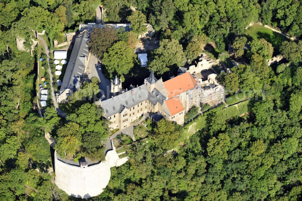 Mansfeld from the bird's eye view: Die, im Zustand der Sanierung befindliche, Burg Mansfeld in Mansfeld, Sachsen-Anhalt. Seit 1999 ist das Schloss Eigentum des Fördervereins Schloss Mansfeld e.V. und ist heute eine christliche Jugendbildungs- und Begegnungsstätte. Castle Mansfeld in the state of renovation in Mansfeld, Saxony-Anhalt. Since 1999 the castle is property of the society Förderverein Schloss Mansfeld e.V. and today it is a christian youth educational and community center.