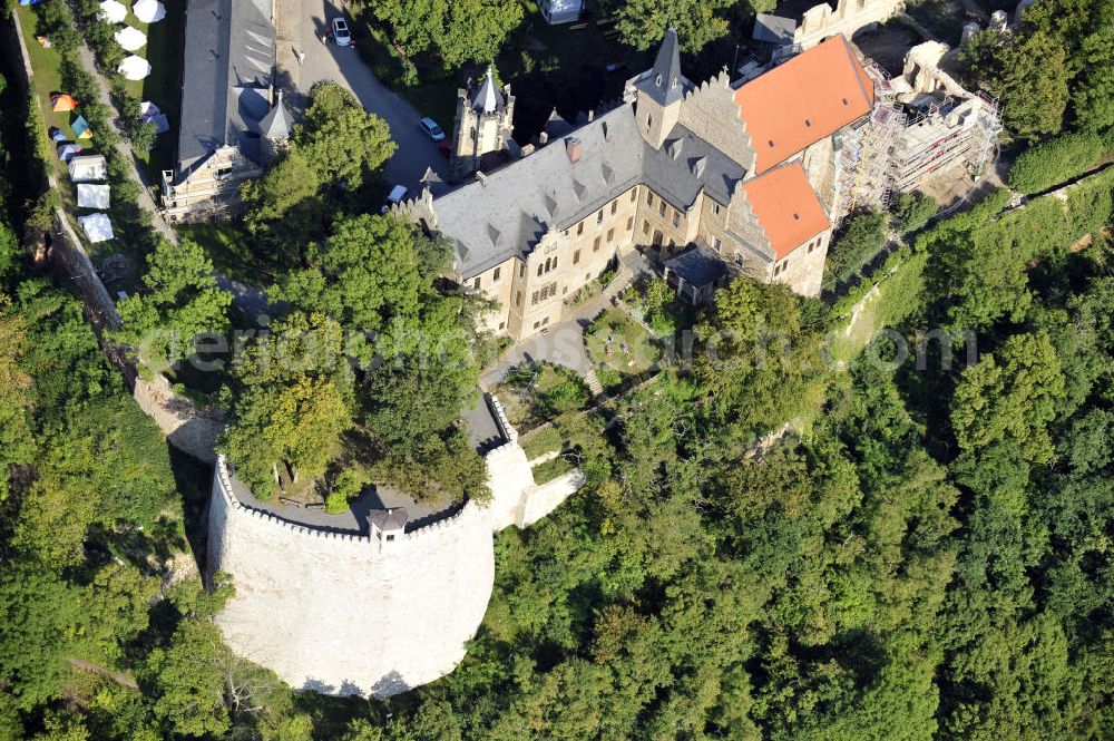 Aerial image Mansfeld - Die, im Zustand der Sanierung befindliche, Burg Mansfeld in Mansfeld, Sachsen-Anhalt. Seit 1999 ist das Schloss Eigentum des Fördervereins Schloss Mansfeld e.V. und ist heute eine christliche Jugendbildungs- und Begegnungsstätte. Castle Mansfeld in the state of renovation in Mansfeld, Saxony-Anhalt. Since 1999 the castle is property of the society Förderverein Schloss Mansfeld e.V. and today it is a christian youth educational and community center.