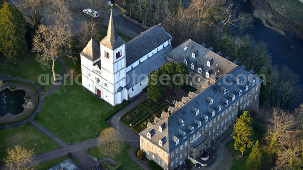 Eitorf from the bird's eye view: Merten Castle or the former Merten Monastery today used as a retirement home in Merten in the state North Rhine-Westphalia, Germany