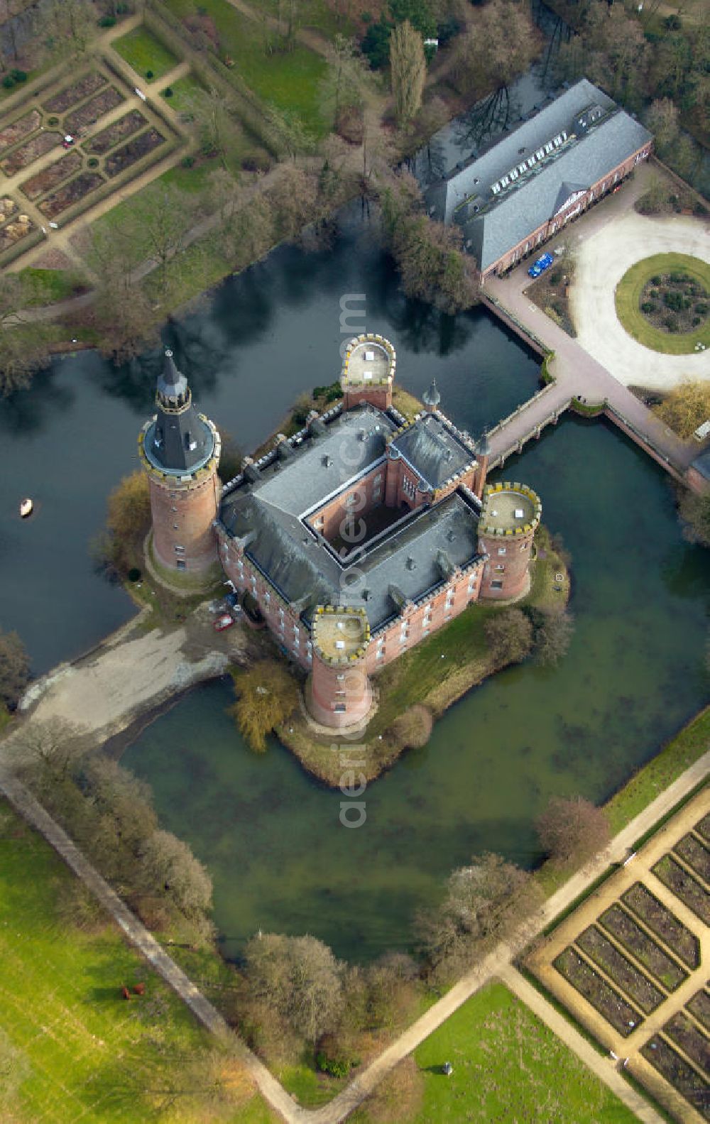 Bedburg-Hau from the bird's eye view: View Moyland, a surge in Bedburg-Hau in the district of Kleve, which is among the most important Gothic buildings in North Rhine-Westphalia. Moyland houses a museum's extensive collection of modern art of the brothers van der Grinten and is a popular destination on the Lower Rhine