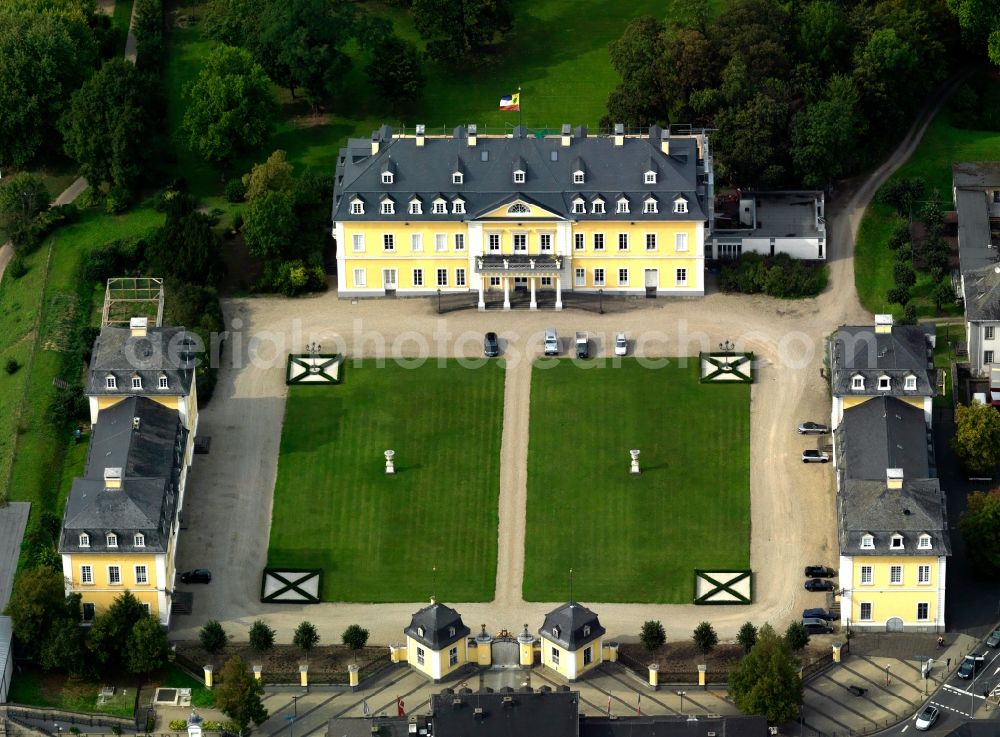 Aerial image Neuwied - Neuwied Castle in the historic centre of Neuwied in the state of Rhineland-Palatinate. Neuwied is located on the river Rhine. The yellow castle with its park and the twin outbuildings is located on the riverbank and is a protected heritage site