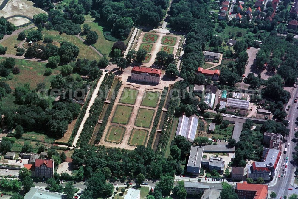 Aerial image Berlin - The castle and the park Friedrichsfelde are part of the zoo in Berlin-Lichtenberg. The castle was built by the architect Johann Arnold Nehring in the Dutch country-style and later received his early classical facade.The garden was created by Peter Joseph. Currently the castle for events and filming is being used