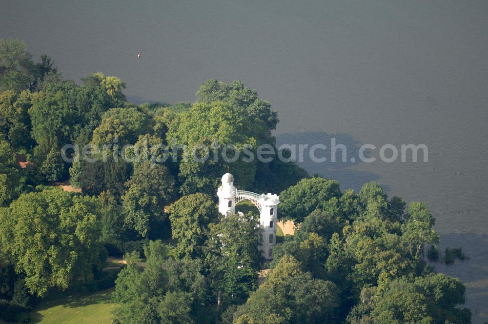 Berlin from the bird's eye view: Blick auf das Schloss auf der Pfaueninsel in der Havel bei Berlin. Die unter Naturschutz stehenden Insel ist ein Landschaftspark und wurde von der UNESCO als Weltkulturerbe ausgezeichnet. Sie gehört zur Stiftung Preußische Schlösser und Gärten Berlin-Brandenburg,