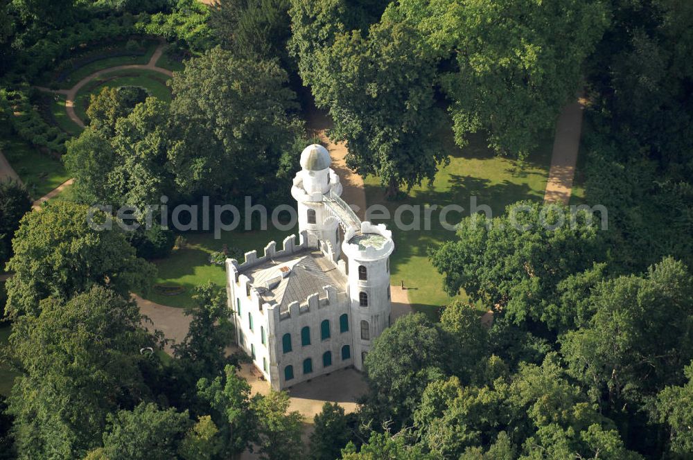 Aerial image Berlin - Blick auf das Schloss auf der Pfaueninsel in der Havel bei Berlin. Die unter Naturschutz stehenden Insel ist ein Landschaftspark und wurde von der UNESCO als Weltkulturerbe ausgezeichnet. Sie gehört zur Stiftung Preußische Schlösser und Gärten Berlin-Brandenburg,