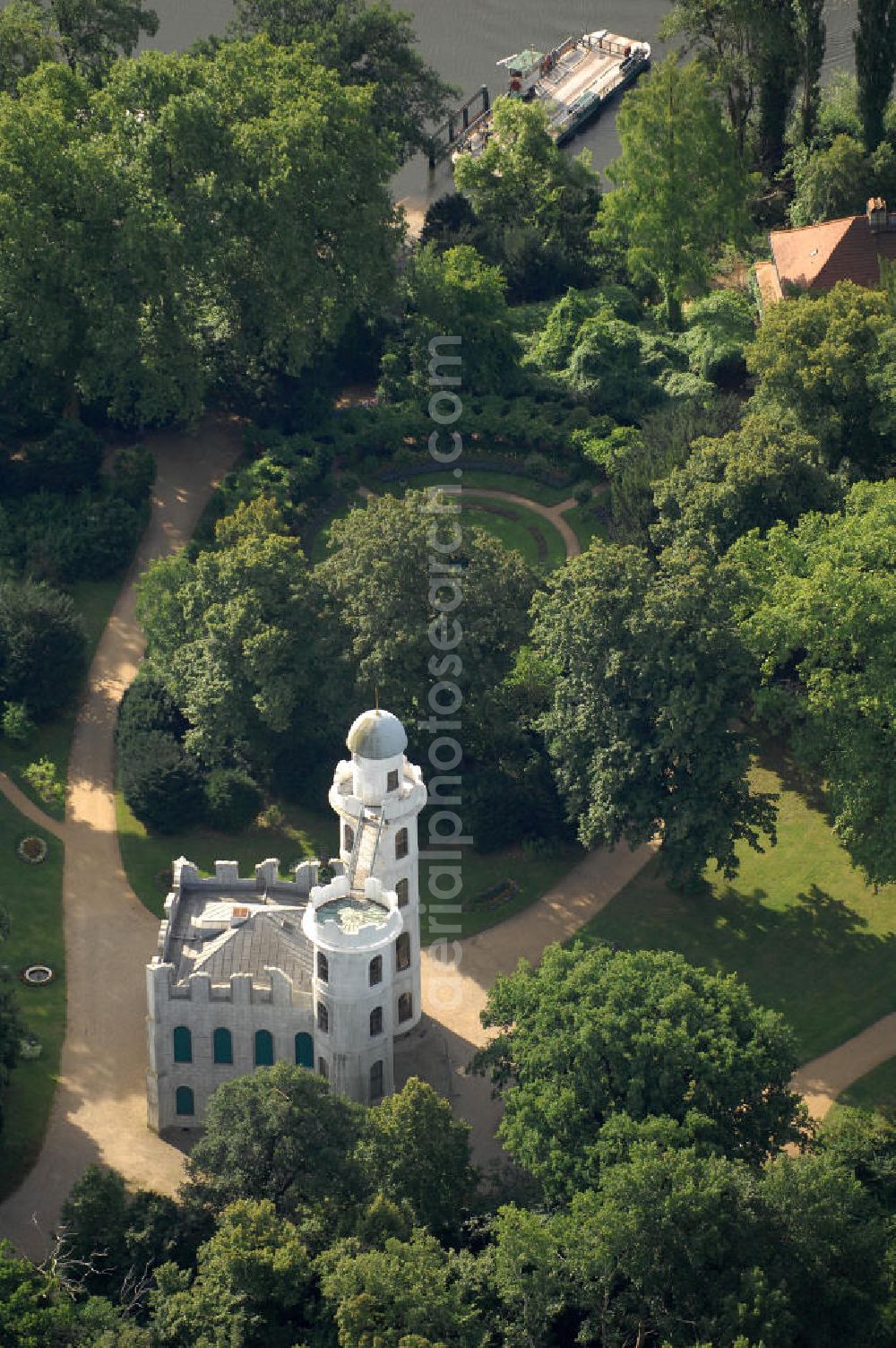 Berlin from above - Blick auf das Schloss auf der Pfaueninsel in der Havel bei Berlin. Die unter Naturschutz stehenden Insel ist ein Landschaftspark und wurde von der UNESCO als Weltkulturerbe ausgezeichnet. Sie gehört zur Stiftung Preußische Schlösser und Gärten Berlin-Brandenburg,