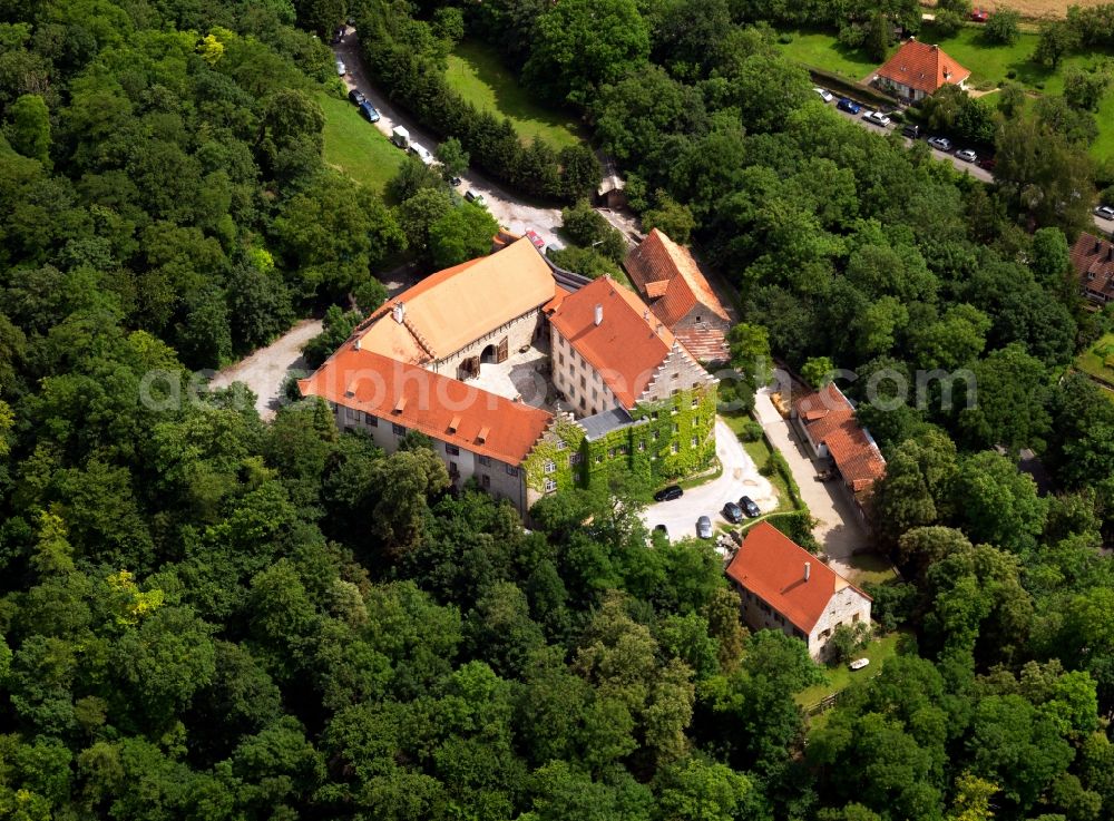 Reichenberg from above - Castle Reichenberg in the village of Reichenberg in the Wuerzburg district in the state of Bavaria. The castle is Wolfgang Gerberely owned by the family of Seydlitz-Wolffskeel and is a listed and protected building. It exists since the 13th century and was completely renovated in 1997. Its buildings and outbuildings are around a trapezoid courtyard