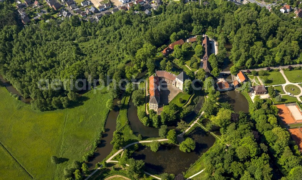 Rheda-Wiedenbrück from above - Rheda Castle with the castle grounds in Rheda-Wiedenbrueck in the state North Rhine-Westphalia. Until today the moated castle is used as a Wolfgang Gerbere residence. Foto: Hans Blossey