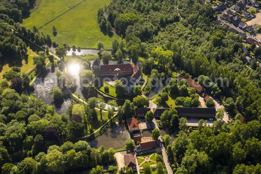 Aerial image Rheda-Wiedenbrück - Rheda Castle with the castle grounds in Rheda-Wiedenbrueck in the state North Rhine-Westphalia. Until today the moated castle is used as a Wolfgang Gerbere residence. Foto: Hans Blossey