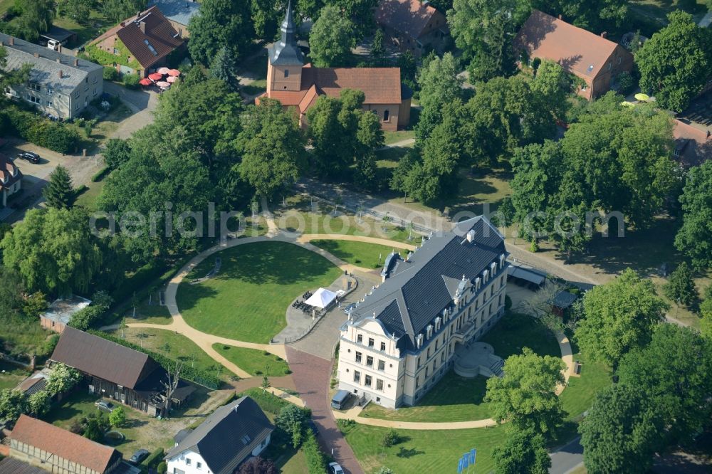 Nauen from the bird's eye view: View of the Ribbeck part of the town of Nauen in the state of Brandenburg. The town is located in the county district of Havelland. Ribbeck is known for the castle from the 19th century, located in its centre. The historic building is surrounded by a park