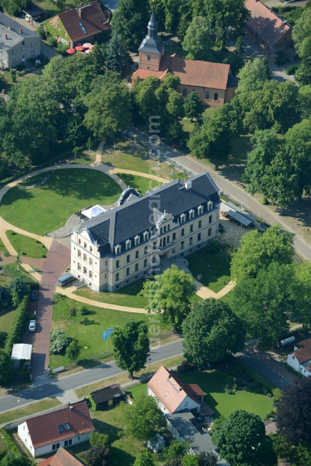 Nauen from above - View of the Ribbeck part of the town of Nauen in the state of Brandenburg. The town is located in the county district of Havelland. Ribbeck is known for the castle from the 19th century, located in its centre. The historic building is surrounded by a park