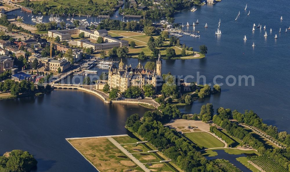 Schwerin from above - Castle with castle Park and Castle lake in Schwerin in the federal state Mecklenburg-West Pomerania. The Schweriner castle is a seat of the Landtag in Meck-Pom