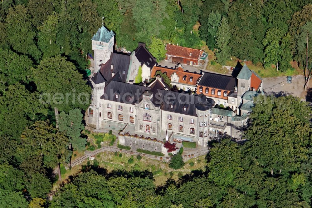 Aerial photograph Münsing - Schloss Seeburg near Muensing in the state of Bavaria. The former Biberkor castle on the banks of the Starnberger See between Allmannshausen and Weipertshausen is a listed monument. The burgundy complex with bay windows, tower, Bergfried, chapel and secondary buildings is used by the Christian children's and youth work of the free religious community Wort des Lebens