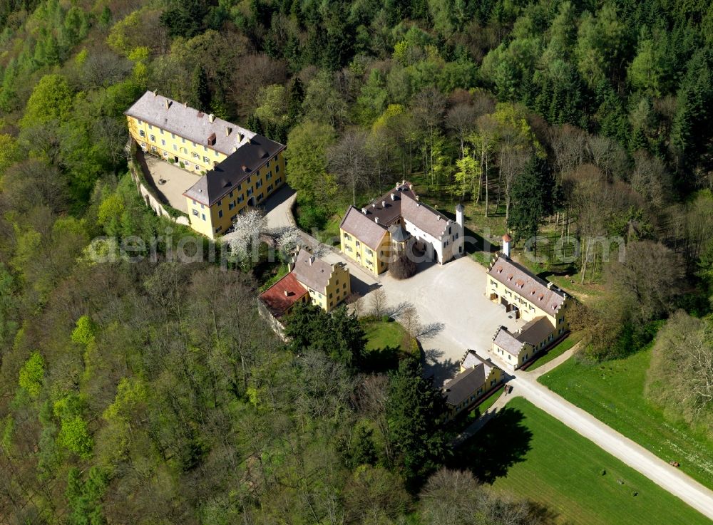 Ziemetshausen from the bird's eye view: Castle Seyfriedsburg in the town of Ziemetshausen in the state of Bavaria. The compound is actually a town part of the borough. The castle consists of a three floor main building and a side wing. A wall connecting the buildings forms a courtyard. The complex has been in existence since the 16th century