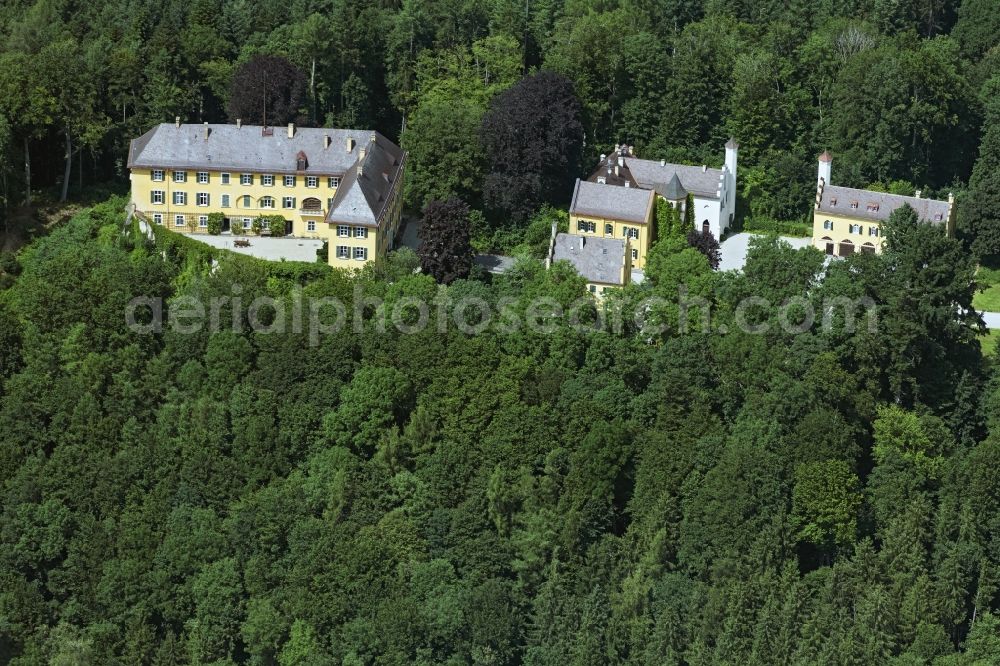 Ziemetshausen from above - Castle Seyfriedsburg in the town of Ziemetshausen in the state of Bavaria. The compound is actually a town part of the borough. The castle consists of a three floor main building and a side wing. A wall connecting the buildings forms a courtyard. The complex has been in existence since the 16th century