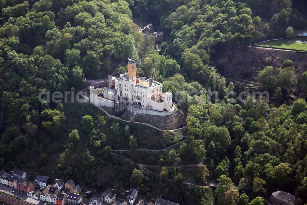 Aerial image Koblenz Stolzenfels - Blick auf das Schloß Stolzenfels im gleichnamigen Stadtteil von Koblenz gegenüber von Lahnstein an der Mündung der Lahn. Das Schloss Stolzenfels ist eine ehemalige Zollburg der Trierer Erzbischöfe, erbaut 1242 - 1259. Nach Zerstörung und Verfall wurde die Burg durch den Koblenzer Architekten Johann Claudius von Lassaulx im Stil der Rheinromantik als Schloss wieder aufgebaut. Castle Stolzenfels in the eponymous district of Koblenz.