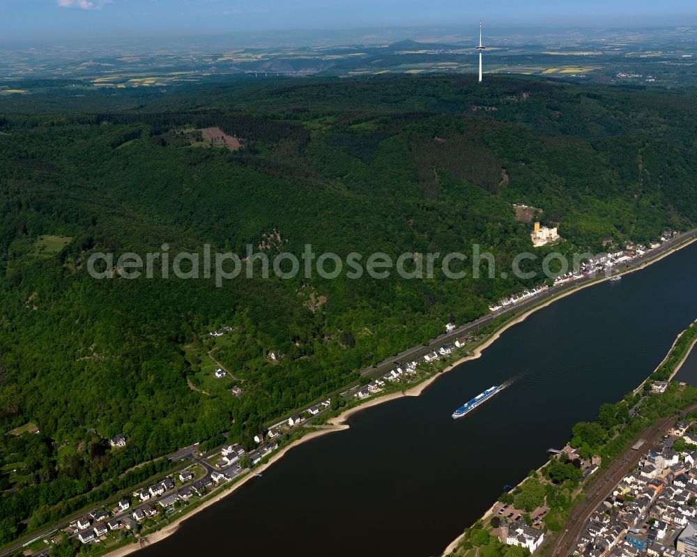 Aerial image Koblenz - Stolzenfels Castle and course of the river Rhine in Koblenz in the state Rhineland-Palatinate. The castle is located on the riverbank of the river Rhine, opposite Lahnstein. The former fortress was rebuilt as a castle in the Rhine romantic style. Railway tracks run in front of it