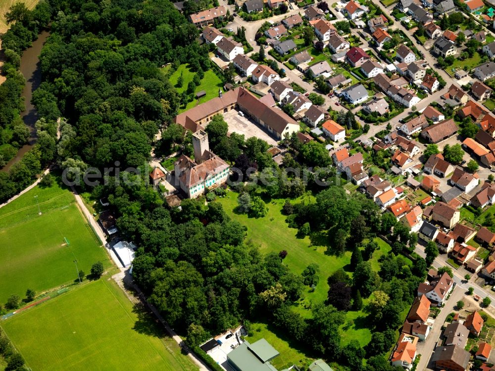 Aerial image Unterriexingen - Unterriexingen Castle in Unterriexingen in the state of Baden-Württemberg. The castle is located above Enz Valley and is based on a fortress from the 12th century. Today it is home of an animal shelter, the animal castle hotel. The castle is located in a residential area