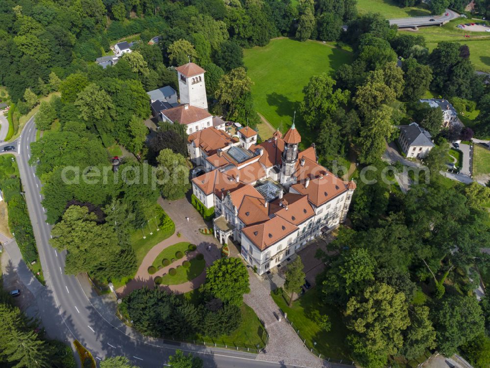 Waldenburg from the bird's eye view: Castle Waldenburg in Waldenburg in the state of Saxony. The castle with its castle keep is surrounded by forest and located on a hill in the Southeast of Waldenburg